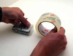 Cover the case in packing tape.