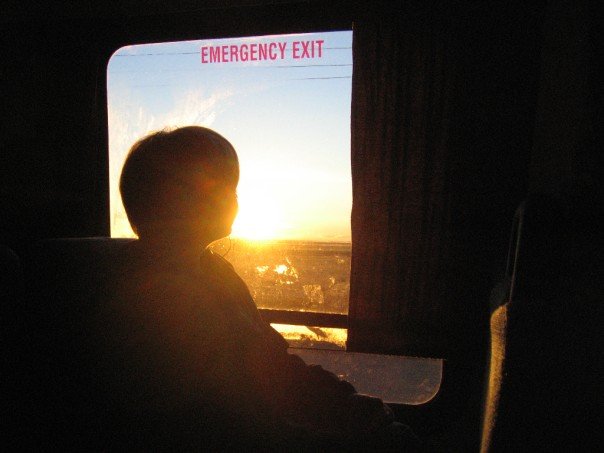 Planning Complex Trips: Best Practices. A photo of me in 2007 on the bus to the West Coast Trail before I found out how bad it was gonna be. Ironically I was sitting by the emergency exit.... I probably should have got off here.
