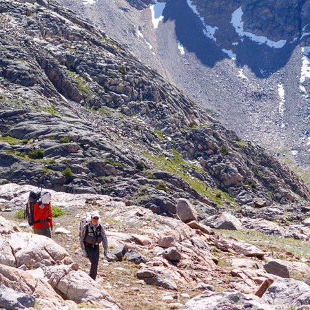 Climbing out of Flat Rock Lake this morning with the massive west face of Sky Pilot Peak in the background.