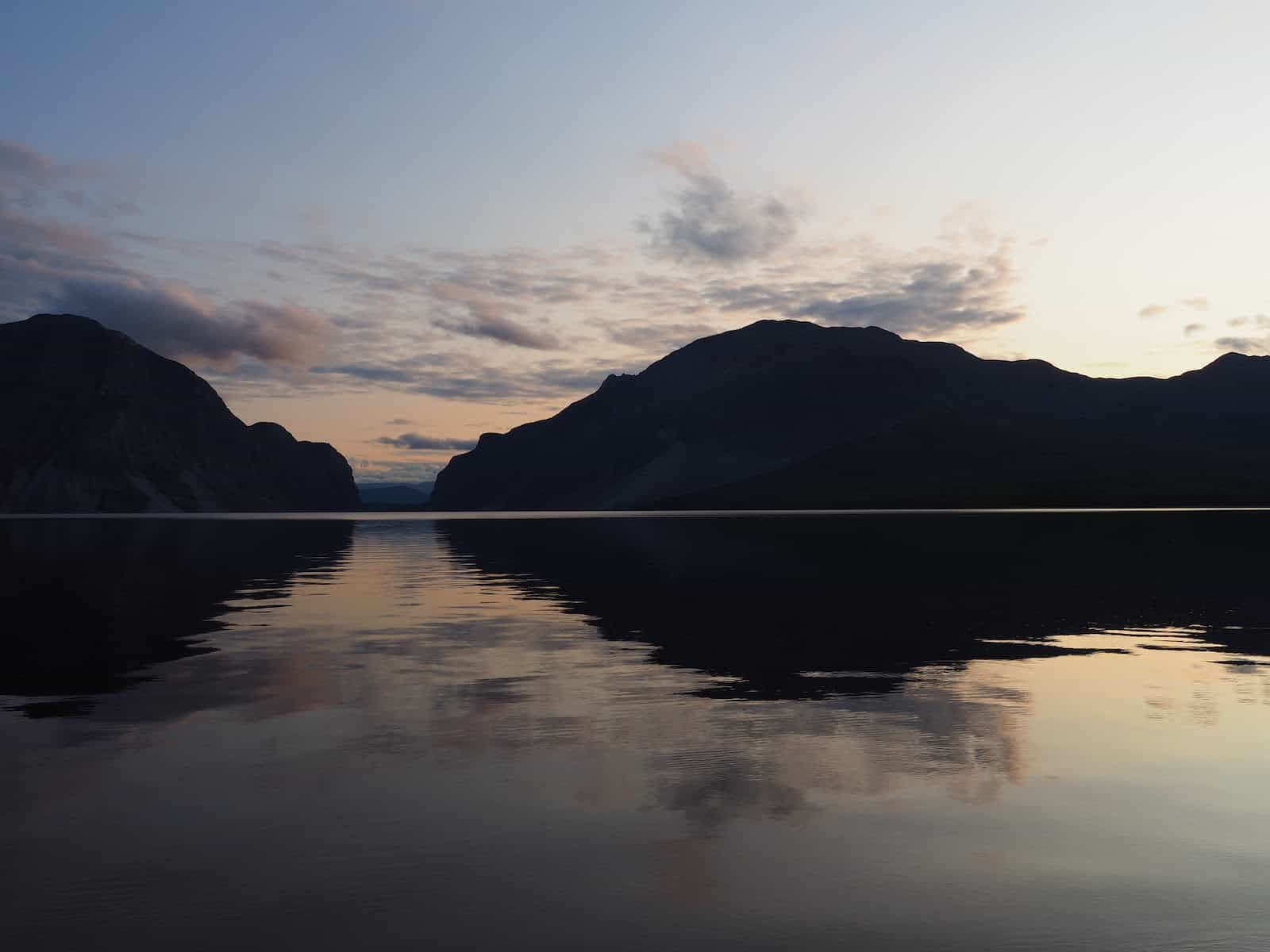 Nahanni River by Canoe: Sunset over a placid lake.