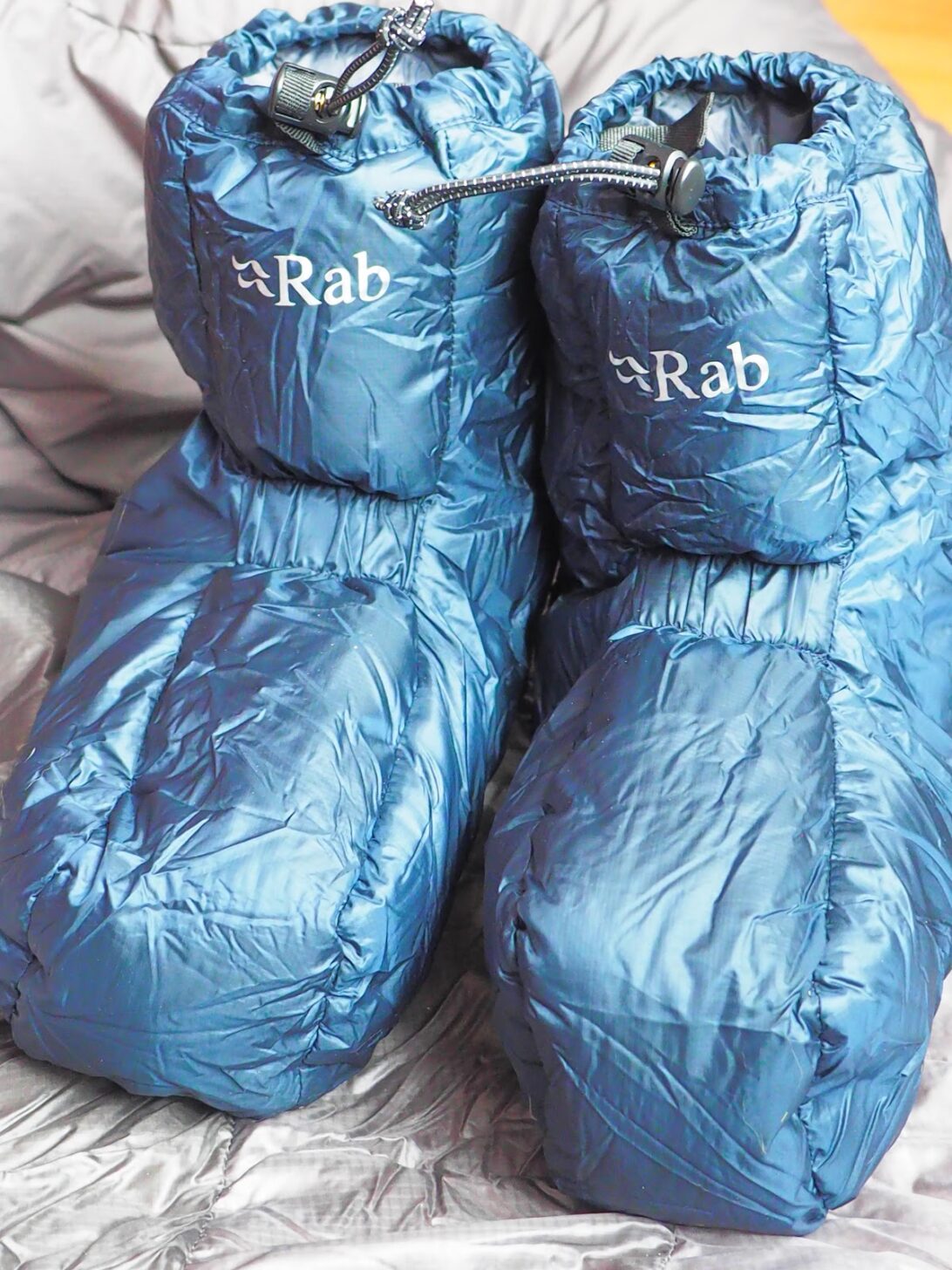 A shot of the Rab Expedition Slippers that allow you to see the elastic panels and well-tailored fit.