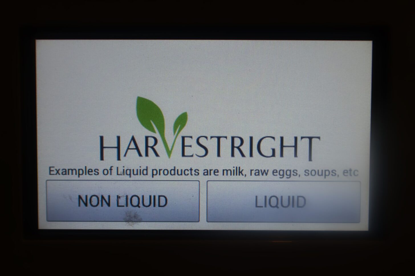 a simple LCD menu that says non-liquid (left) and liquid (right)