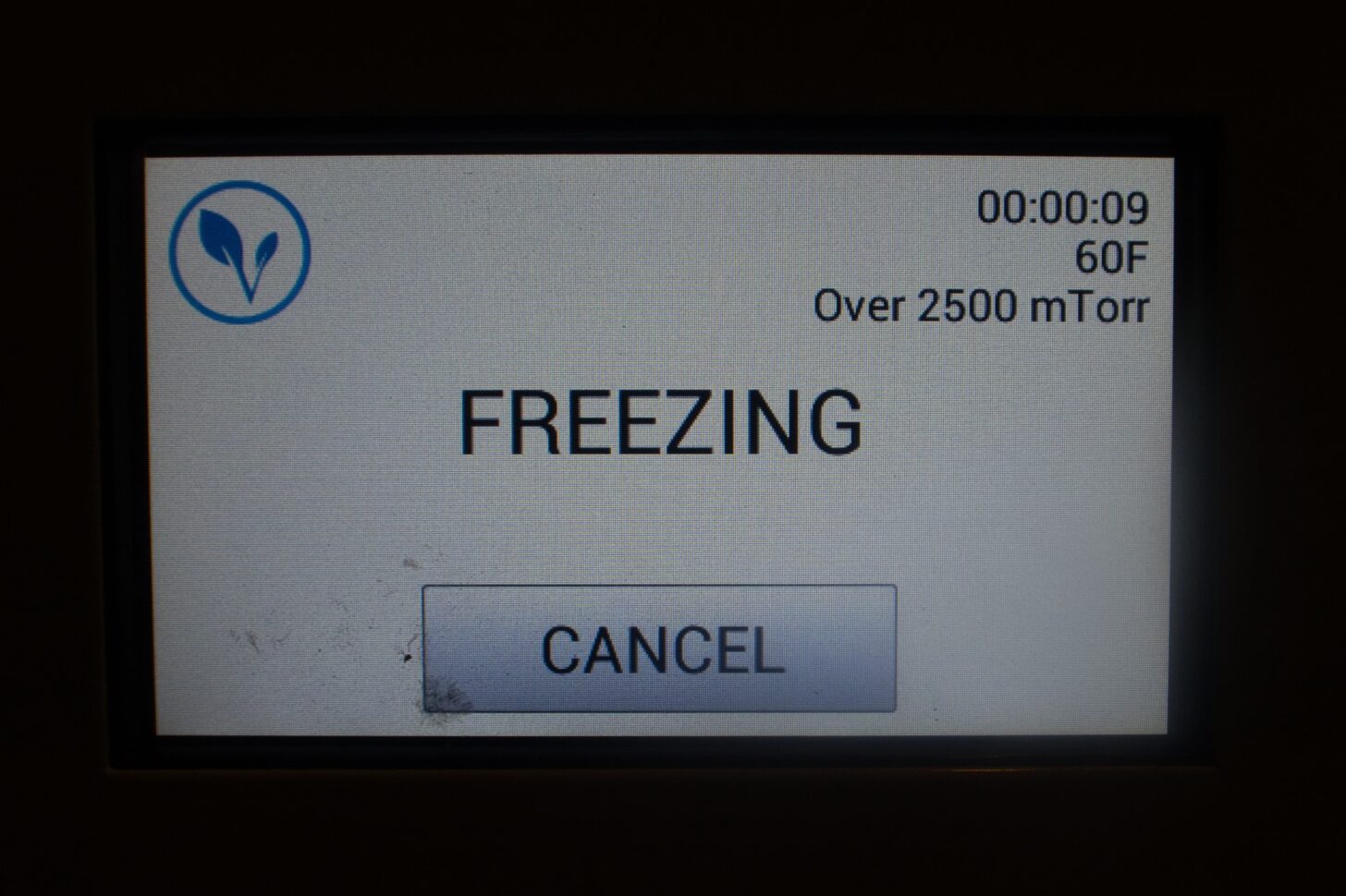 a menu on the harvest right freeze dryer that says freezing and lists a time to completion