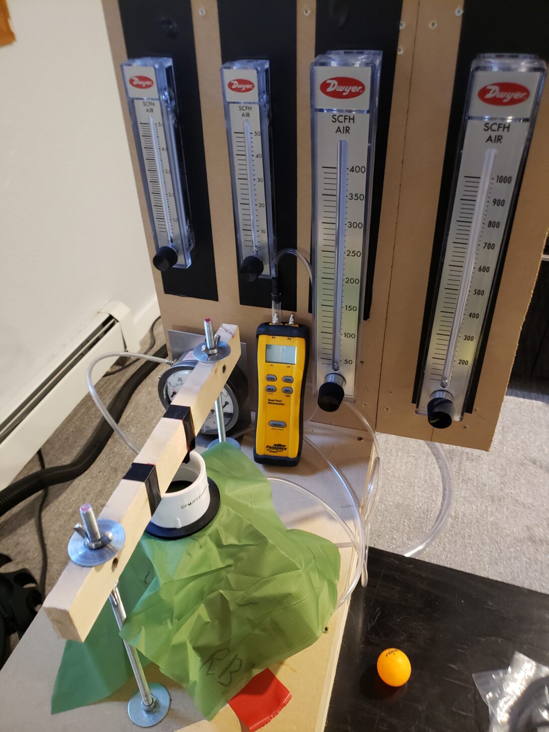a photo showing Stephen's air permeability test equipment and a fabric sample in the apparatus.