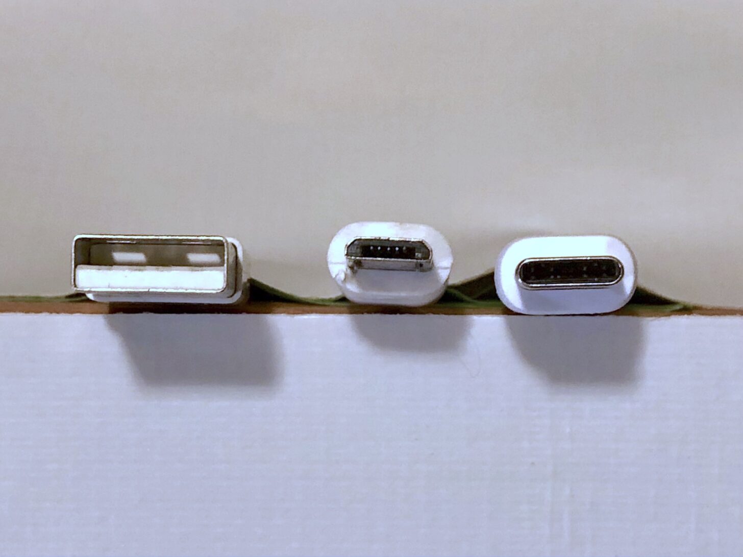 a row of three USB connector types
