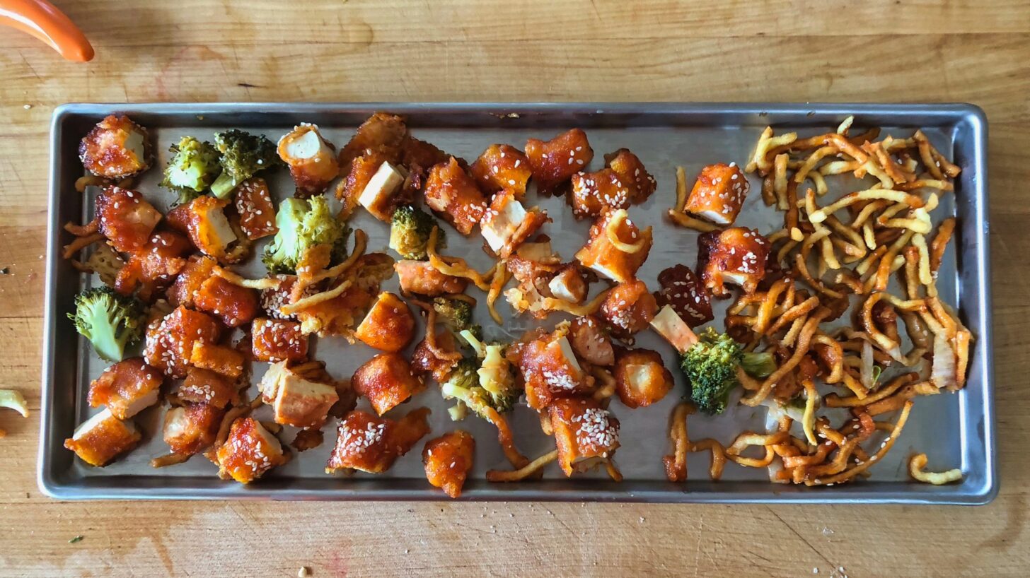 asian food spread out on a tray, ready to slide into a freeze-dryer