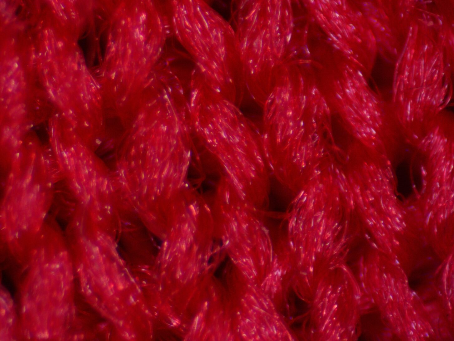 an extreme close-up of red fabric