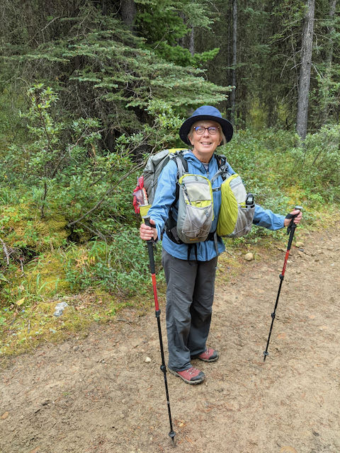woman hiking with a backpack