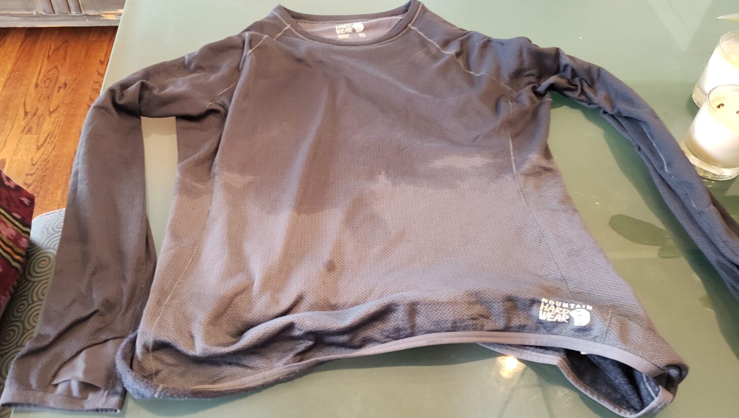 a medium shot showing a shirt soaked from about the mid-torso up.
