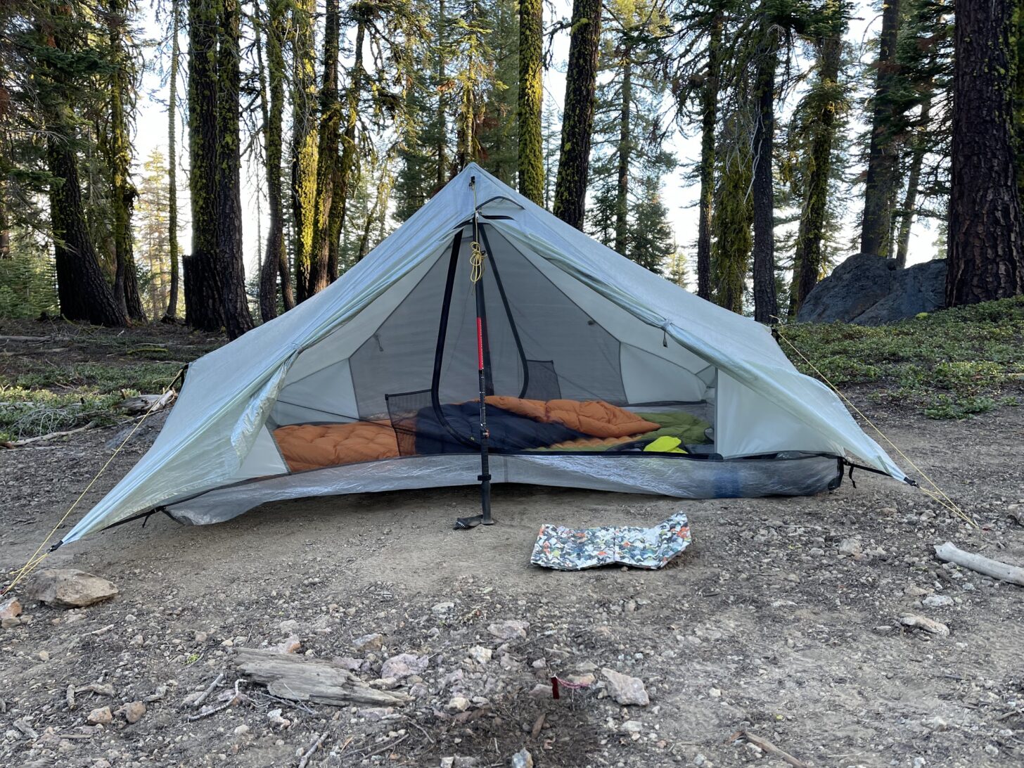 A tarptent shot from head-on, with the doors rolled back.