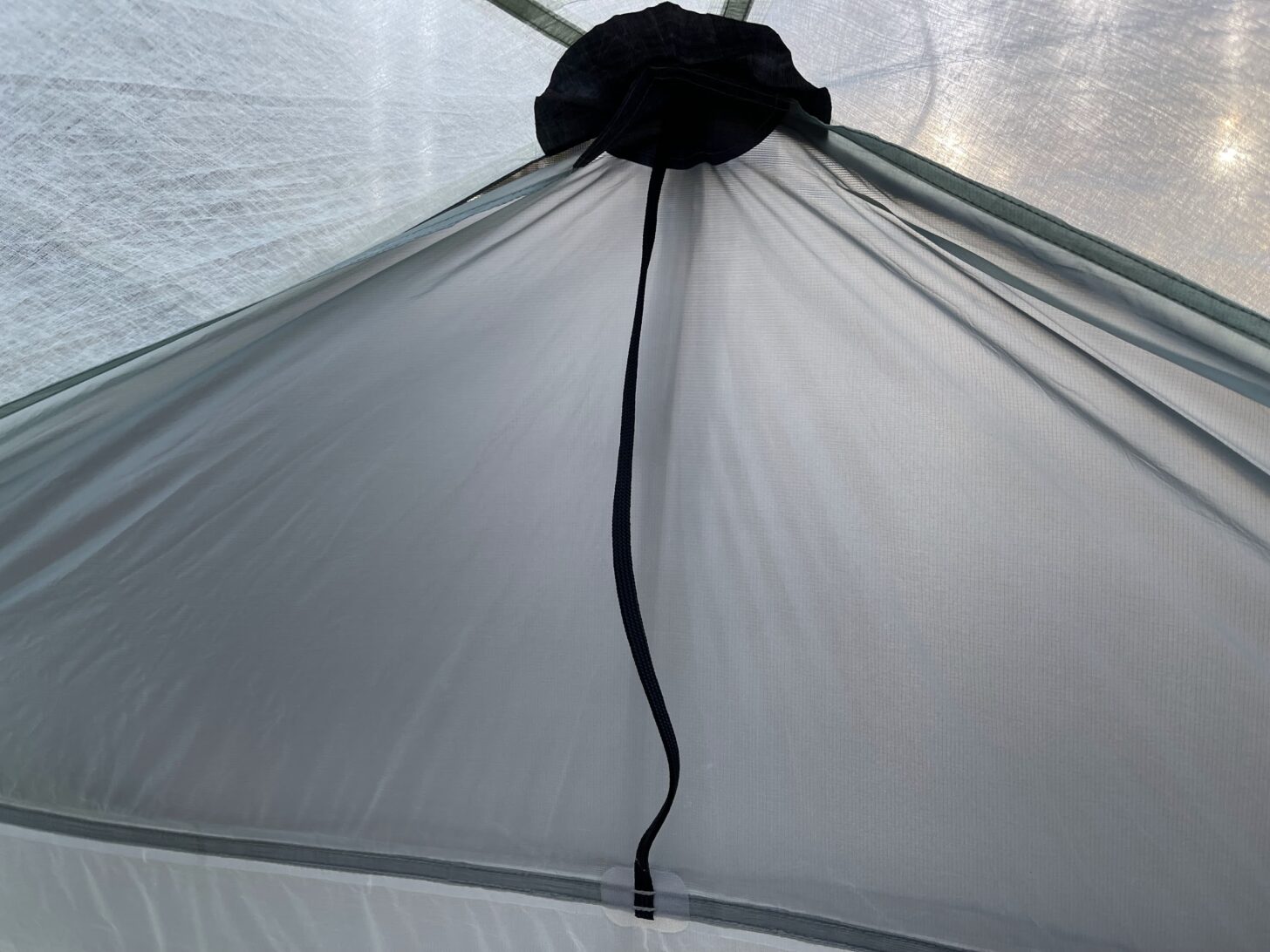 A close-up of a rain protection panel on the inside of the tent.
