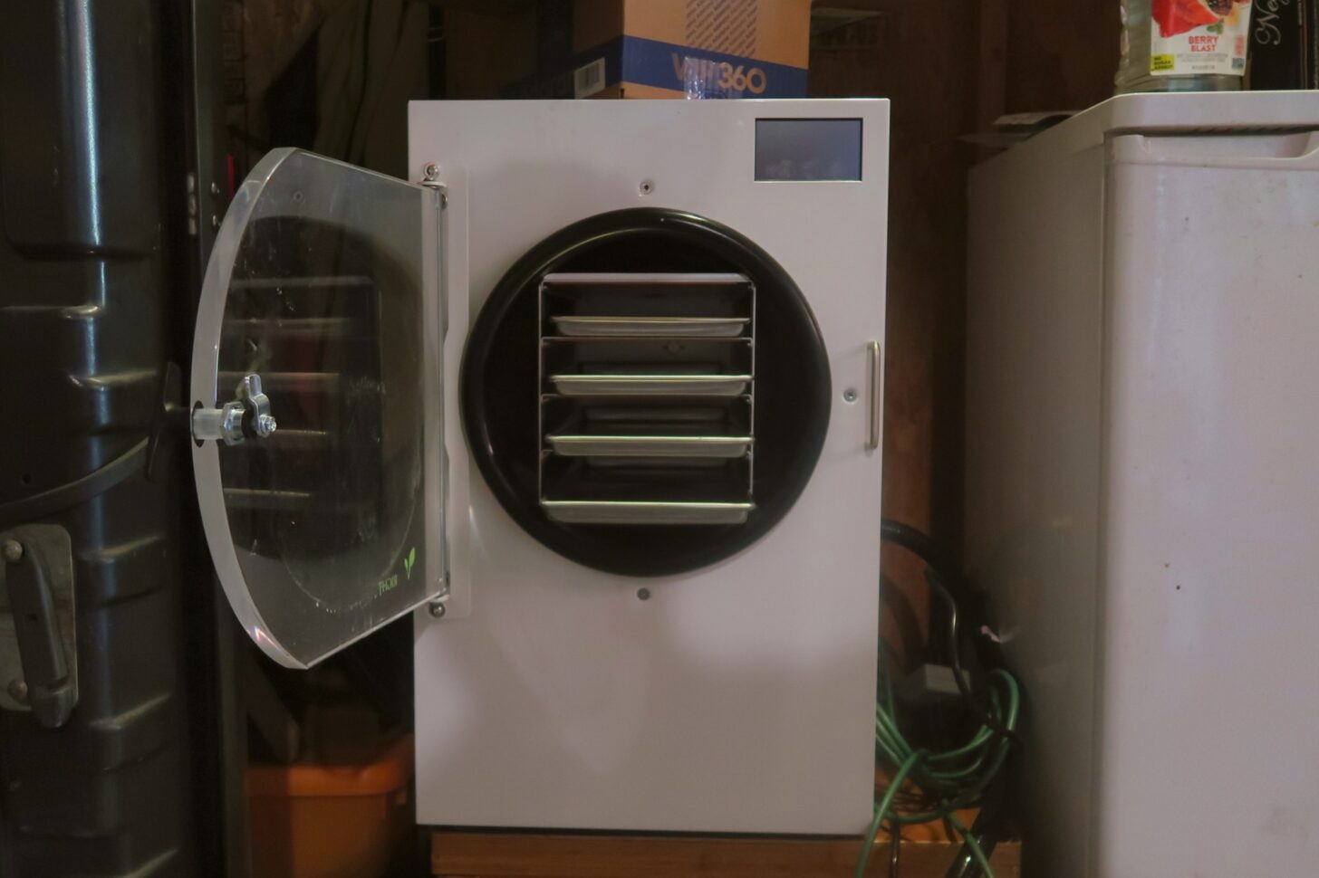 a photo of the harvest right home freeze dryer in a garage