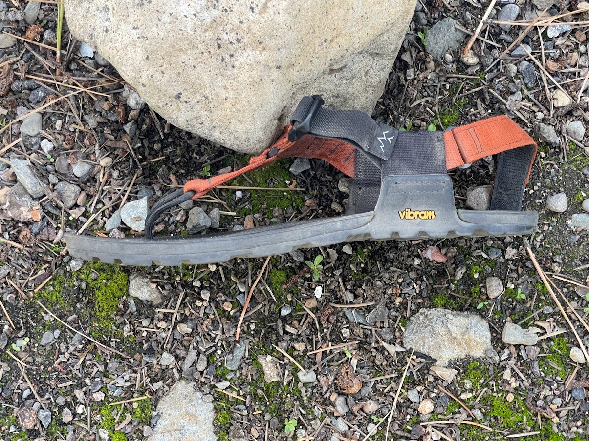 A shot from above with the sandal tipped on its side to show thickness