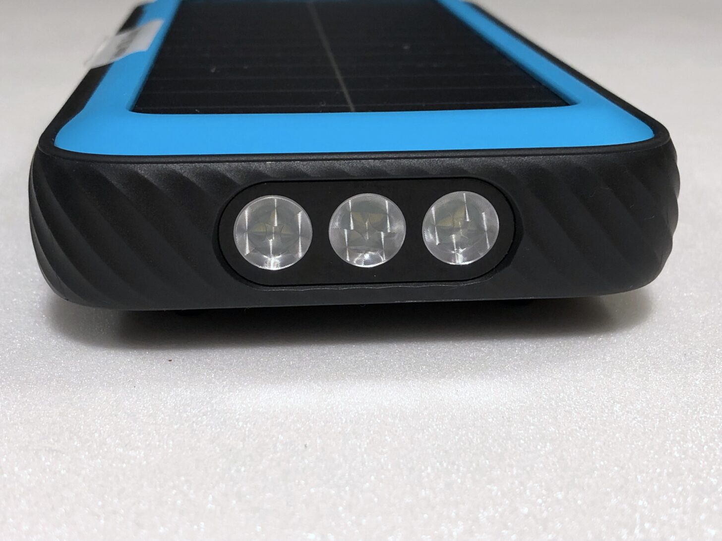 The Anker 20K Solar showing three white LEDs at one end.