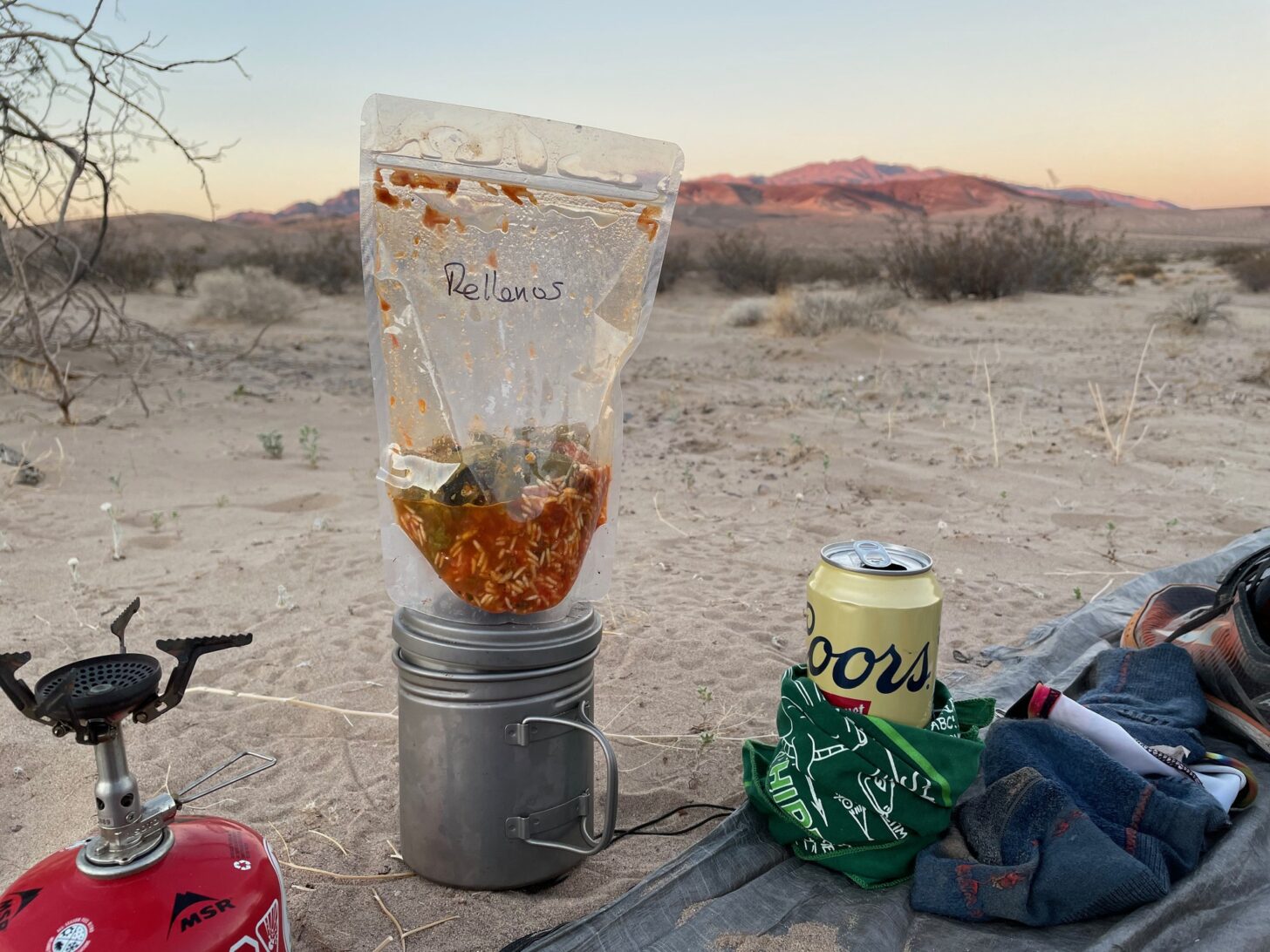A bag of chiles rellenos and a beer in the Mojave Desert.