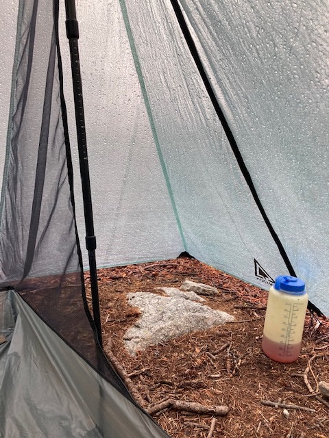 water bottle in a tent vestibule