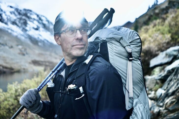 photo of hiker wearing a backpack