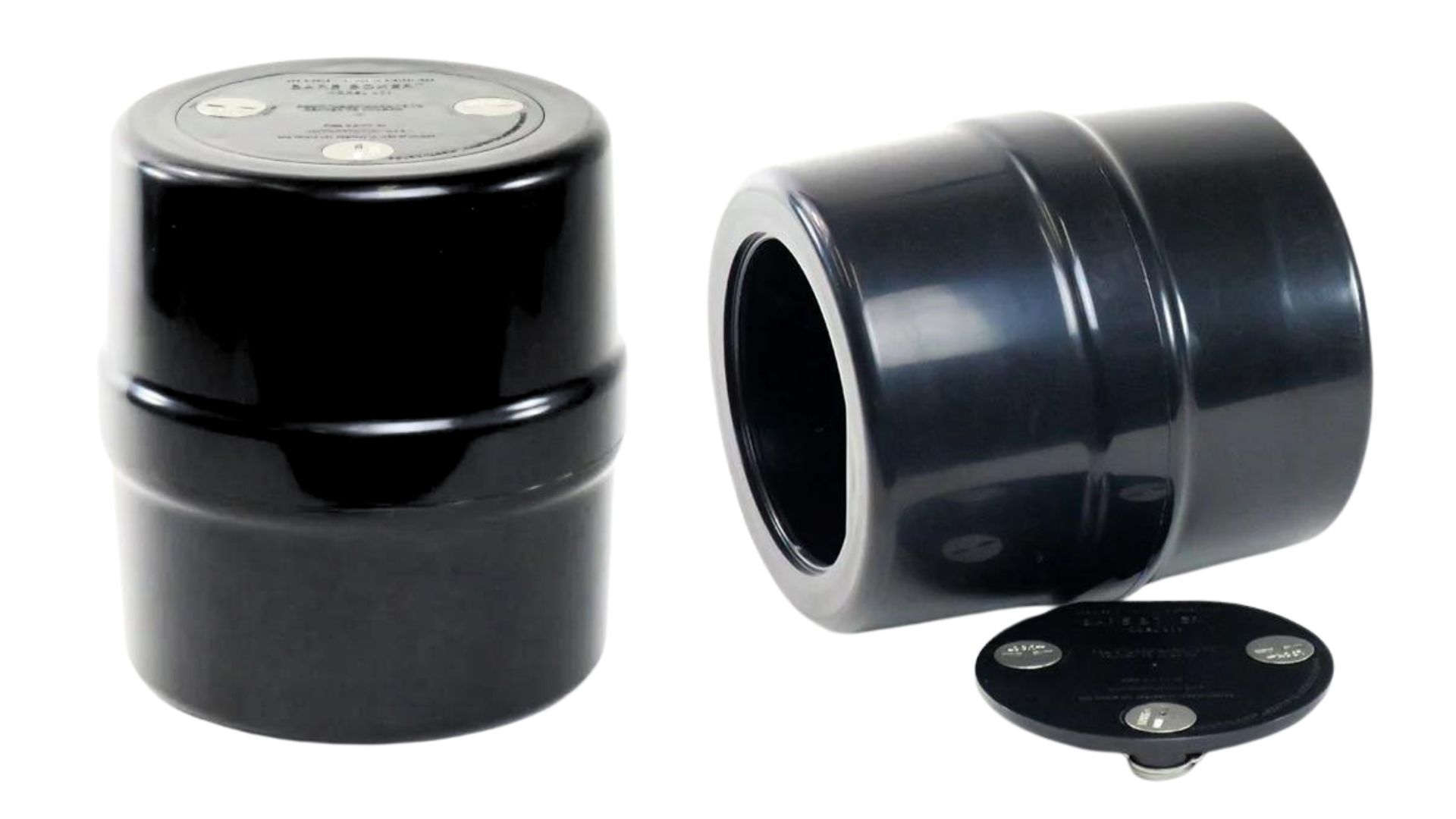 a couple of black containers sitting next to each other