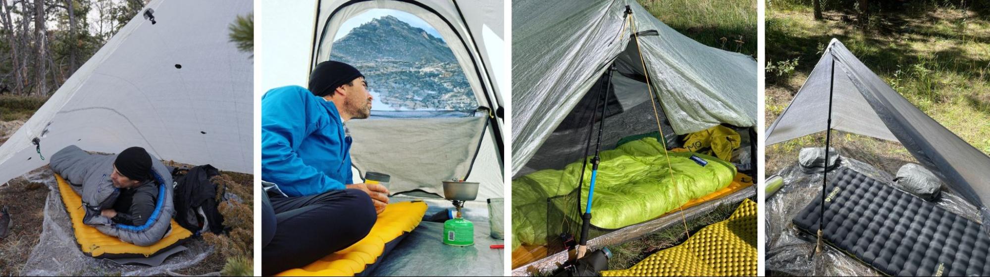 a man sitting inside of a tent next to a sleeping bag