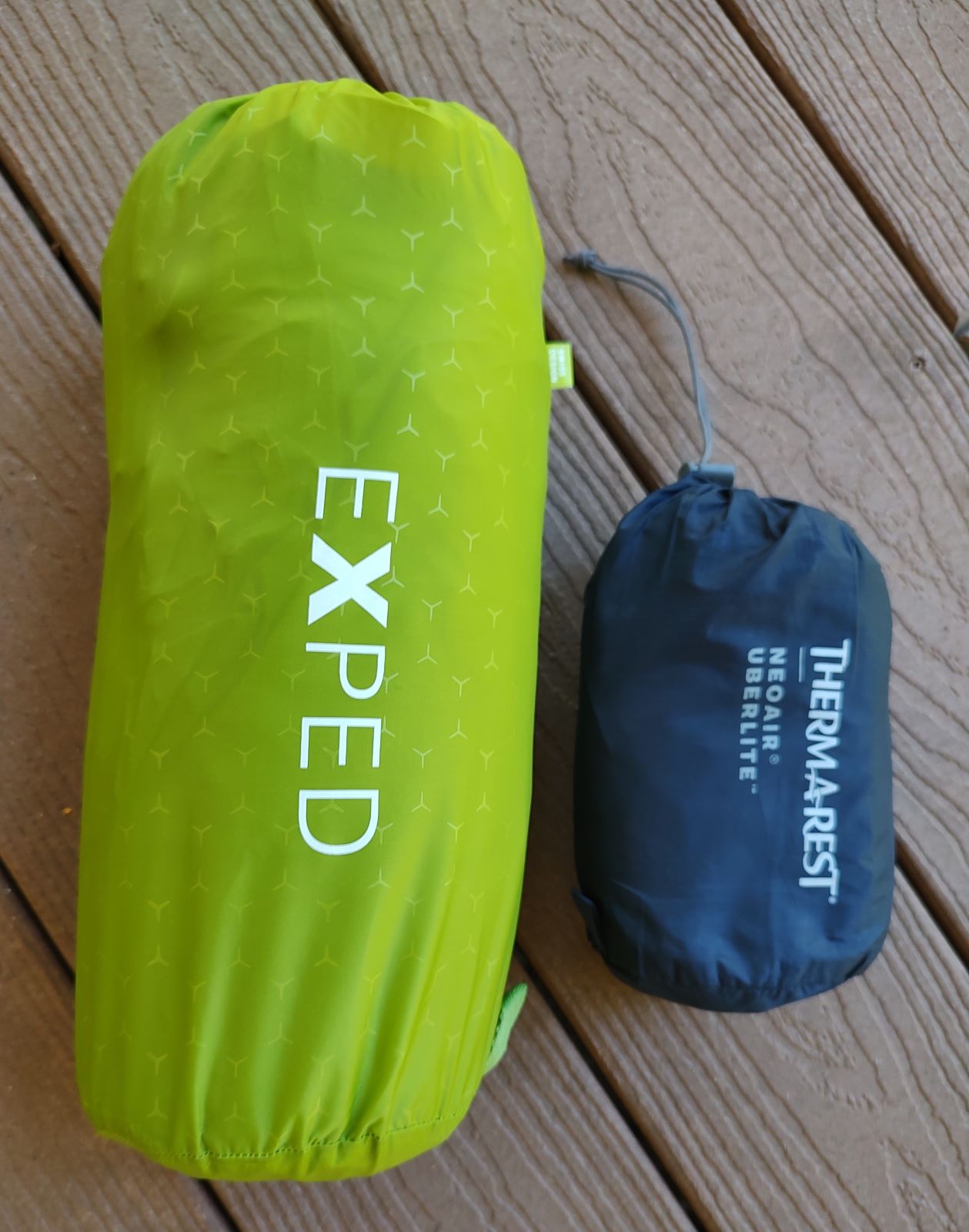 two sleeping pads in stuff sacks