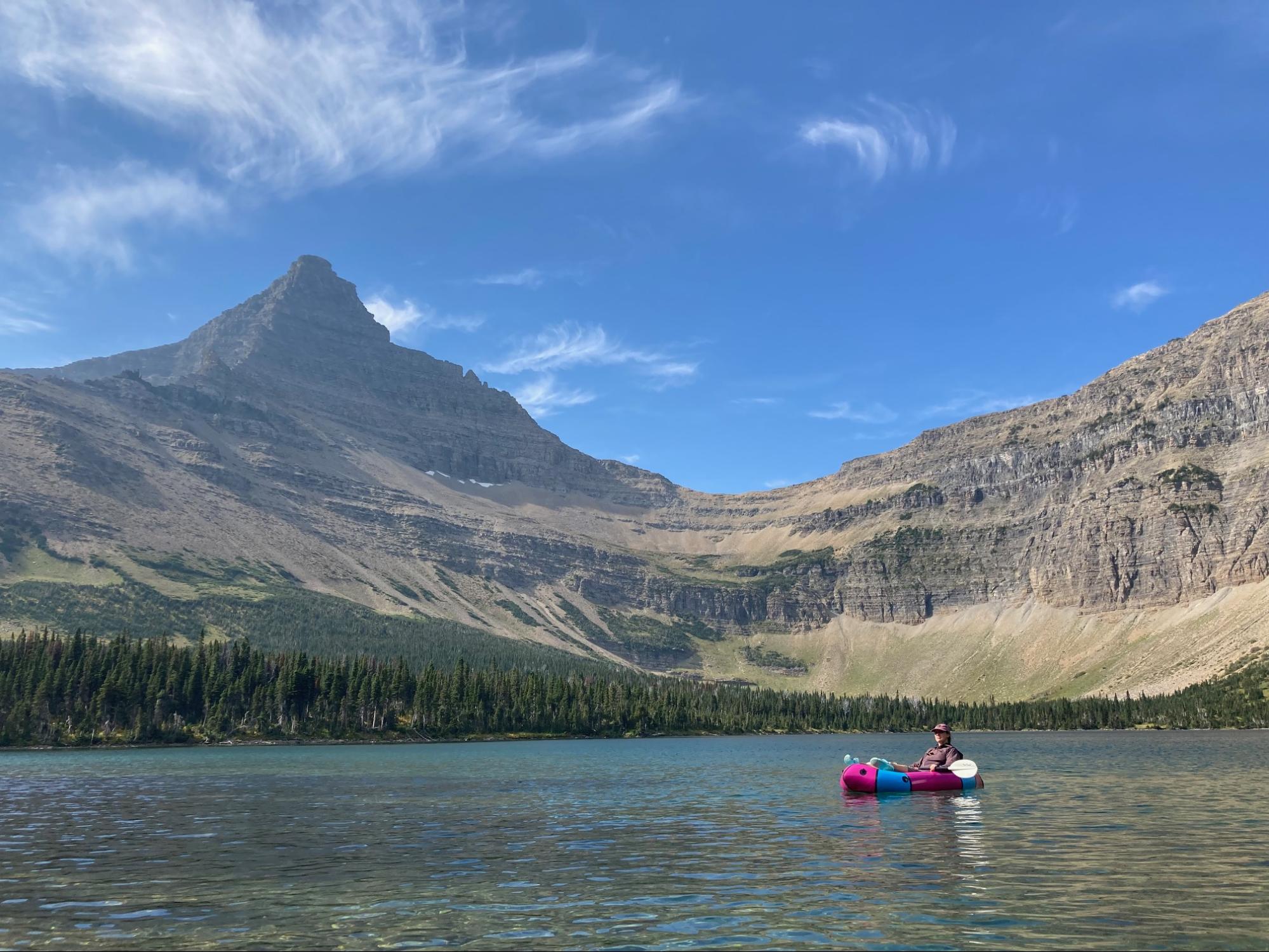 Packrafting a high mountain lake.