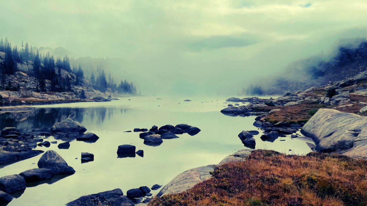 fog over an alpine lake