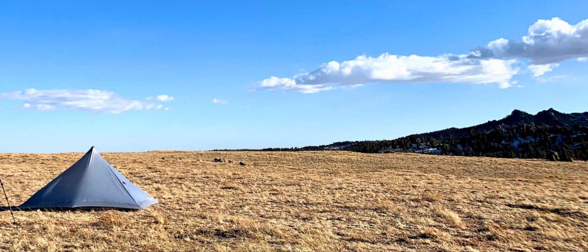 tent in alpine meadow