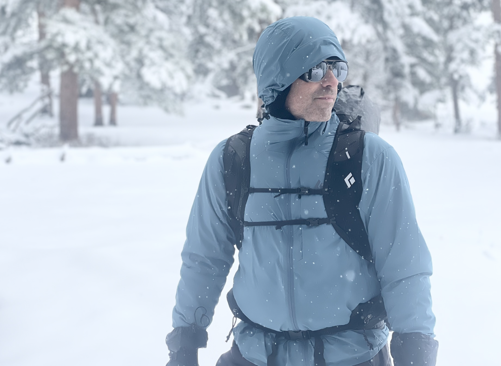 ryan in a windshirt in snow