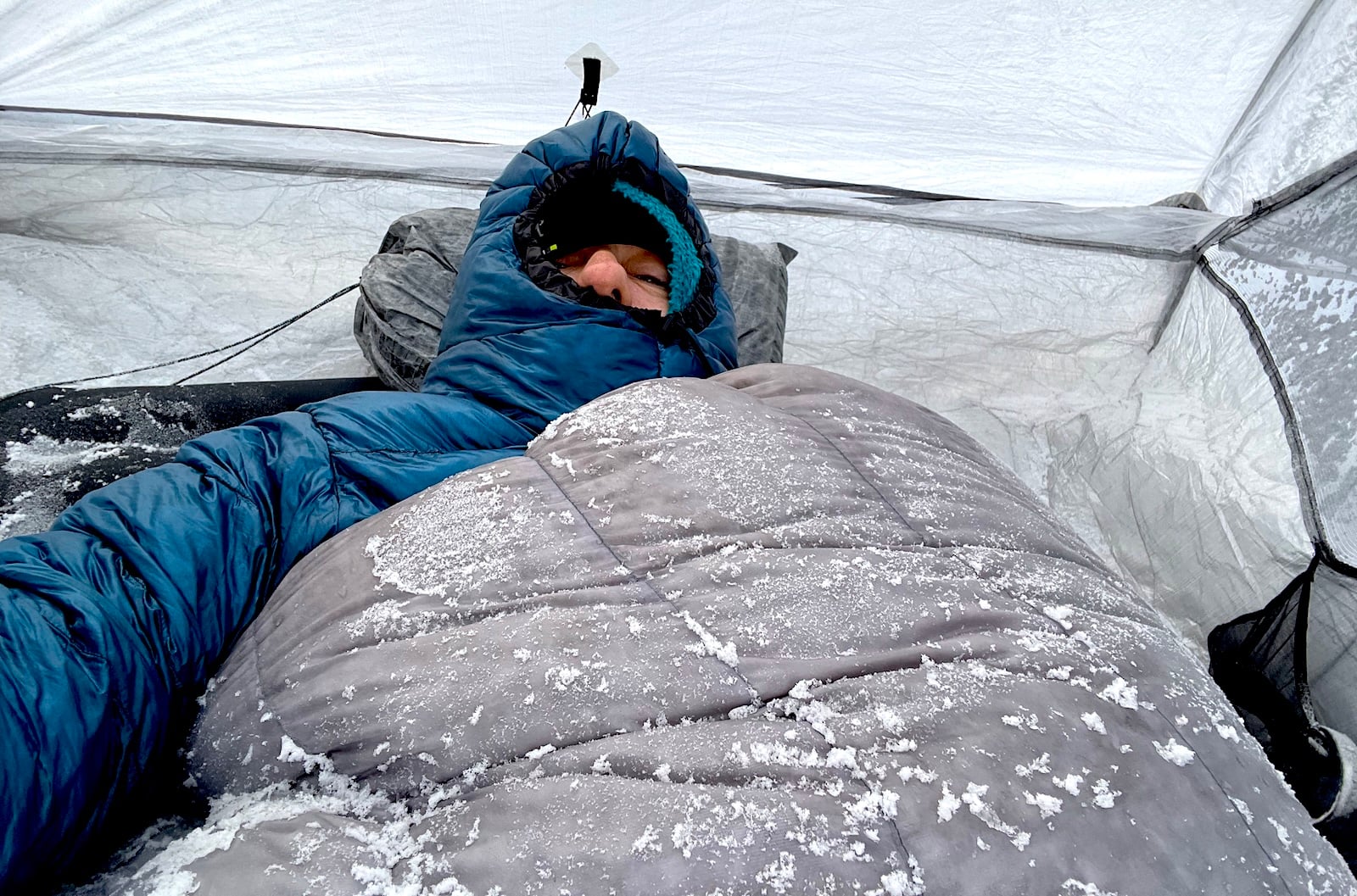 ryan in a snowy sleeping bag