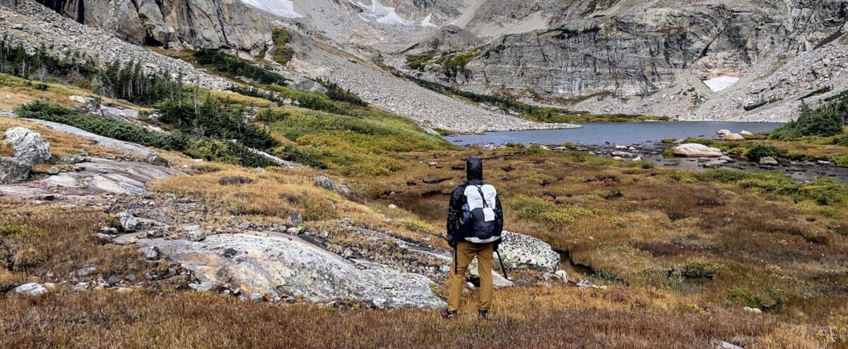 hiker in mountain cirque