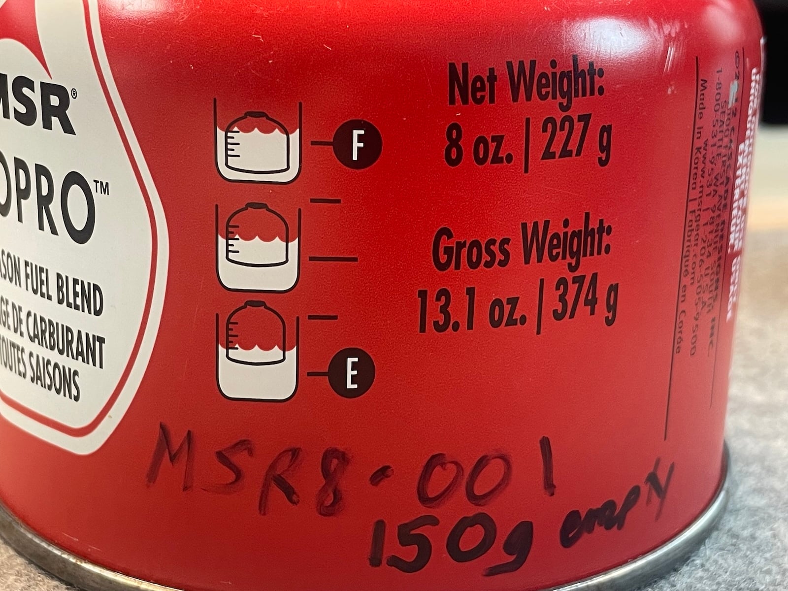 fuel canister showing fuel capacity gauge on side