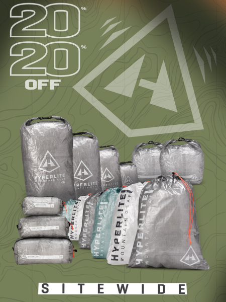 Hyperlite Mountain Gear 20 percent off sitewide with assorted stuff sacks and packing cubes on green background
