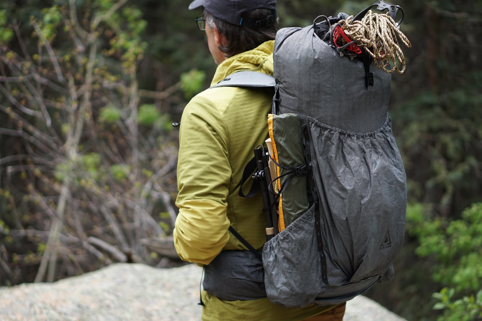 man wearing backpack up close