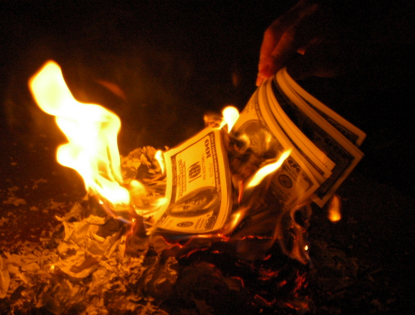 burning pile of money