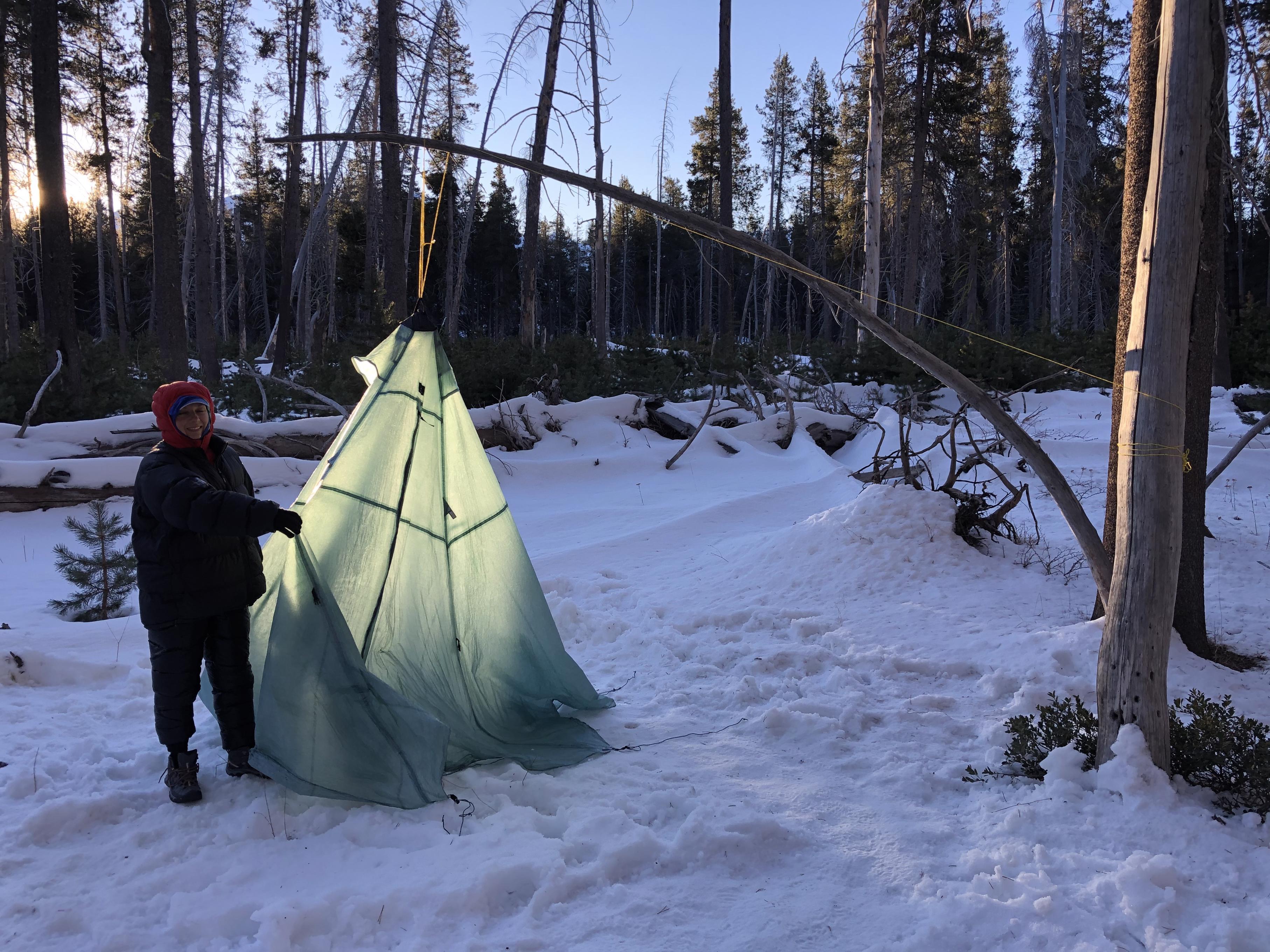 Gela takes down the tent